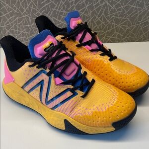 New Balance men’s Yellow & Pink Athletic Sneakers with Blue Accents